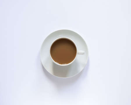 white cup with coffee on whiteの写真素材