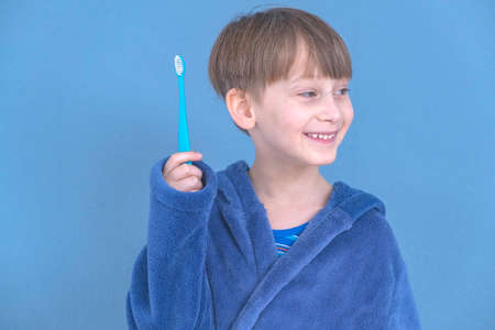 the boy with the toothbrush. Health care, dental hygiene. Little boy cleaning teeth.の写真素材
