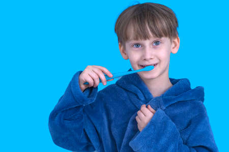 the boy with the toothbrush. Health care, dental hygiene. Little boy cleaning teeth.の写真素材
