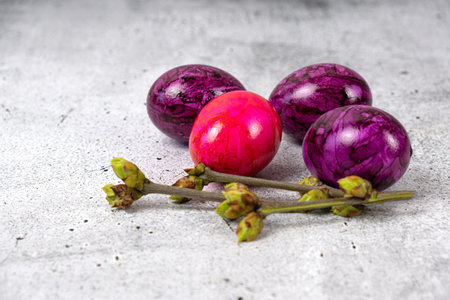 Easter eggs on a light gray background. Easter eggs magenta colorの写真素材