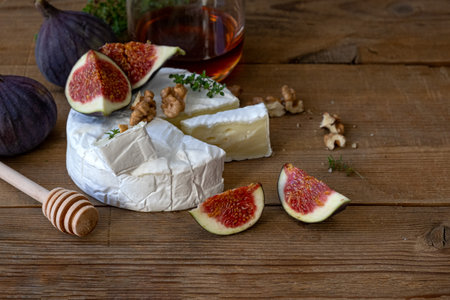 Cheese camembert with nuts , honey figsの写真素材