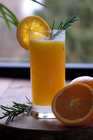 Freshly squeezed orange juice in a glassの写真素材