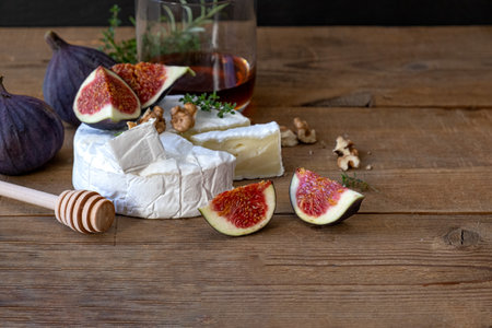 Cheese camembert with nuts , honey figsの写真素材