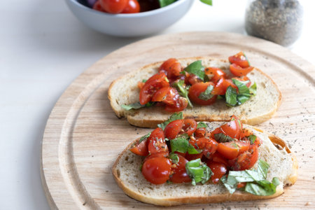 Sandwiches with baked cherry tomatoes. Bruschetta with tomatoesの写真素材
