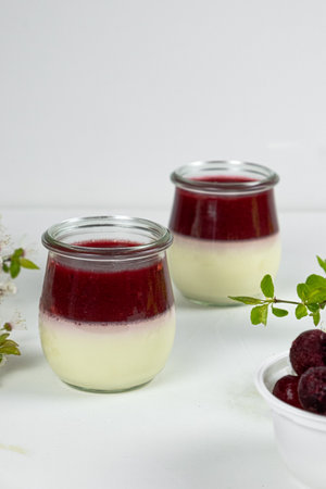 Milk cherry panna cotta, vertical photoの写真素材