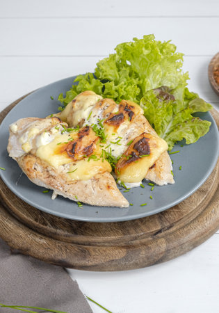 Chicken fillet baked on a plateの写真素材