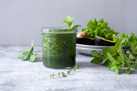 Blended green smoothie with ingredients. Healthy smoothieの写真素材