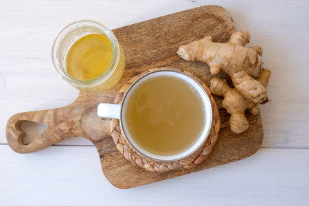 Ginger tea in a mug on a white backgroundの写真素材