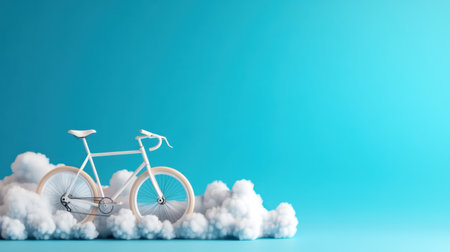 Dreamy cycling moment with white bike hovering below soft clouds in blue spaceの素材