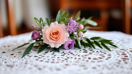 Classic lace doily with dainty floral arrangement, emphasizing soft tones and texturesの素材