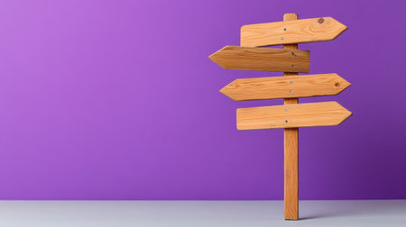 Simple wooden directional sign with arrows pointing opposite ways, purple backgroundの素材
