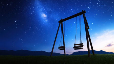 Night sky explodes with stars as a swing set stands in peaceful silhouetteの素材