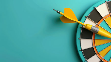 A vibrant aqua background highlights a close-up view of a dartboard featuring a yellow dart poised at the edge, symbolizing focus and goal-setting.の素材