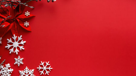 A vibrant red background adorned with white snowflakes and decorative elements evokes a festive winter atmosphere perfect for holiday celebrations.の素材