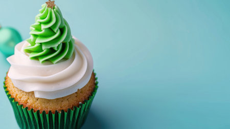 Delight in this festive green tree cupcake topped with creamy frosting. Perfect for holiday celebrations, this sweet treat brings joy and color to any occasion.の素材