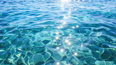 A mesmerizing view of sparkling water surface capturing sunlight reflections on calm ocean waves, evoking feelings of tranquility and serenity.の素材