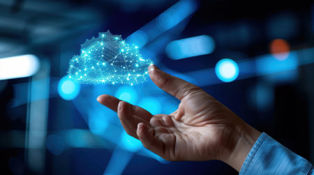 A creative representation of digital cloud technology showcased by a human hand, symbolizing connectivity and innovation in a modern data-driven world.の素材