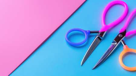 This image showcases a set of colorful scissors placed on a vibrant blue and pink background. Ideal for illustrating creative projects, arts, and crafts.の素材