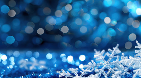 A stunning close-up of delicate snowflakes resting on a vibrant blue surface. This image captures the magical essence of winter with sparkling bokeh lights, evoking feelings of joy and celebration. Perfect for seasonal themes.の素材