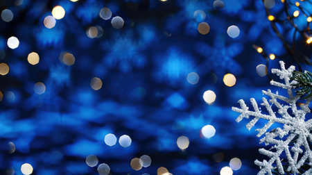 A stunning winter background featuring delicate snowflakes and twinkling lights against a deep blue backdrop, perfect for festive holiday designs and joyful celebrations.の素材