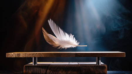 A delicate white feather elegantly hovers above a wooden stand, illuminated by soft light and surrounded by swirling smoke, creating a tranquil atmosphere.の素材