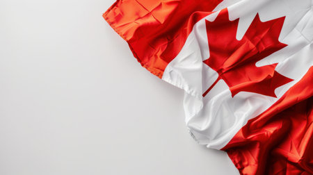 This image features a vibrant Canadian flag with its distinctive red and white colors, showcasing a maple leaf in a stunning and artistic manner. Ideal for various creative projects.の素材