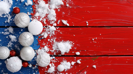 This image showcases white and red Christmas ornaments scattered on a wooden surface, adorned with snow, perfect for holiday themes and festive designs.の素材