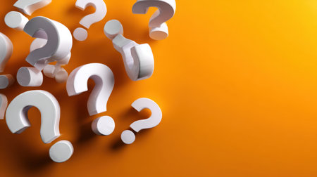 A striking image of floating white question marks against a vibrant orange backdrop, representing curiosity, inquiry, and the quest for knowledge in a modern design context.の素材