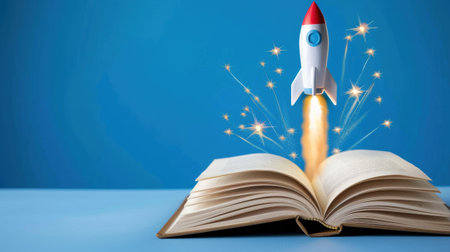 A vibrant image showing a rocket launching from an open book, symbolizing the power of imagination and creativity in education and exploration.の素材