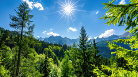 This breathtaking mountain landscape captures the essence of nature with bright sunlight, lush trees, and a clear blue sky, offering a serene escape.の素材