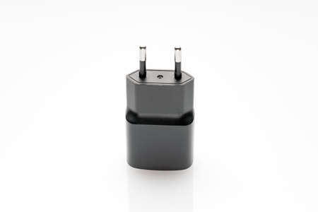 black plug of the USB adapter on a white backgroundの写真素材