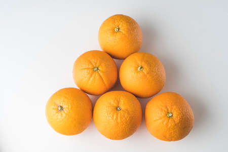 fresh oranges in a transparent plastic bagの写真素材