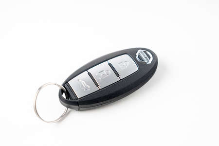 the Key to a new Nissan car on a white backgroundのeditorial素材