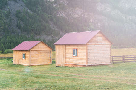 wooden house on in the mountains, recreation center in the mountains, cottages in the valley of the mountains,の写真素材