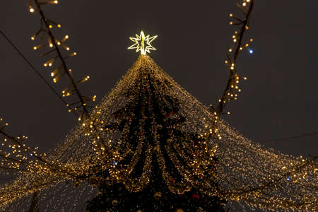 Russia, Moscow January 11 2021, Christmas in Moscow, Christmas and New Year festivities decoration of city streets. beautiful illumination of various city buildings at Christmas in Moscowのeditorial素材