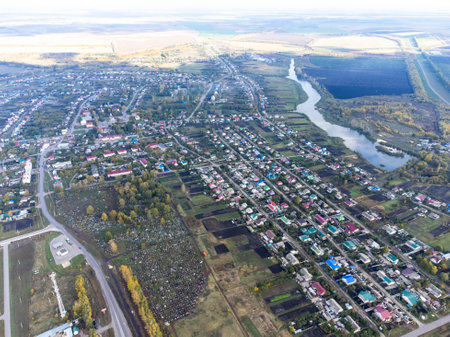 cottage village from a birds-eye view, Country houses stand in straight rows. Small cottages with colorful roofs. . The concept is to buy a house in the countryside, a place to build, Rural villageの写真素材