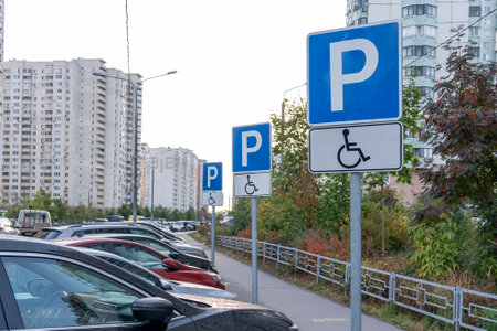 A disability sign in the parking lot.のeditorial素材