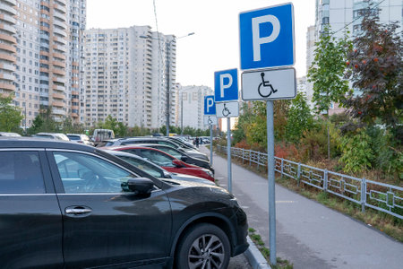 A disability sign in the parking lot.のeditorial素材