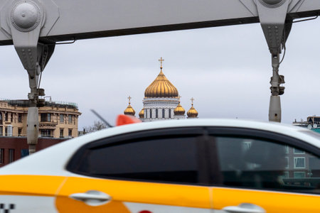 A taxi car in Moscow, drives across the Crimeanのeditorial素材