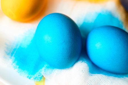 Painted eggs on the table after painting, a symbolの写真素材