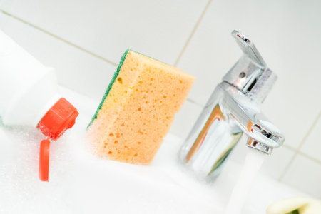 Cleaning plumbing with cleaning products, gloveの写真素材