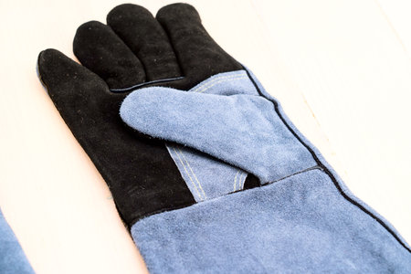 close-up heat-resistant gloves on a whiteの写真素材