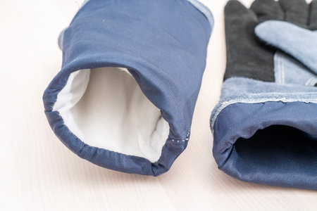 close-up heat-resistant gloves on a whiteの写真素材