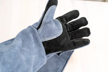 close-up heat-resistant gloves on a whiteの写真素材