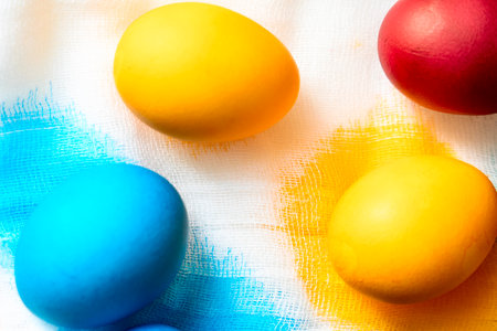 Painted eggs on the table after painting, a symbol of Easter, traditions to paint eggs in different colors on the holiday of Orthodox Easter. high quality photoの写真素材