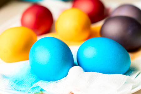 Painted eggs on the table after painting, a symbol of Easter, traditions to paint eggs in different colors on the holiday of Orthodox Easter. high quality photoの写真素材