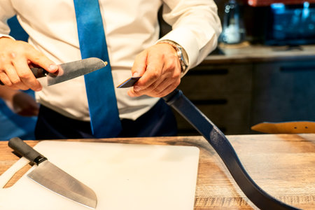 trim the belt in your pants, A man shortens the trouser belt with improvised means.strap long...