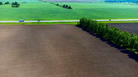 spring plowing of fields view from a height. high quality photoの写真素材