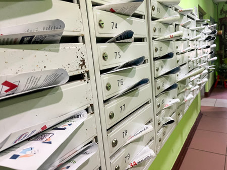 Moscow September 05, 2022, mailboxes in the entrance of a residential building are packed with campaign leaflets before the elections. Campaigning and election campaignの写真素材