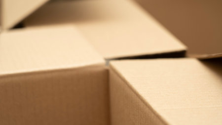 open cardboard boxes close-up, cutout for handle